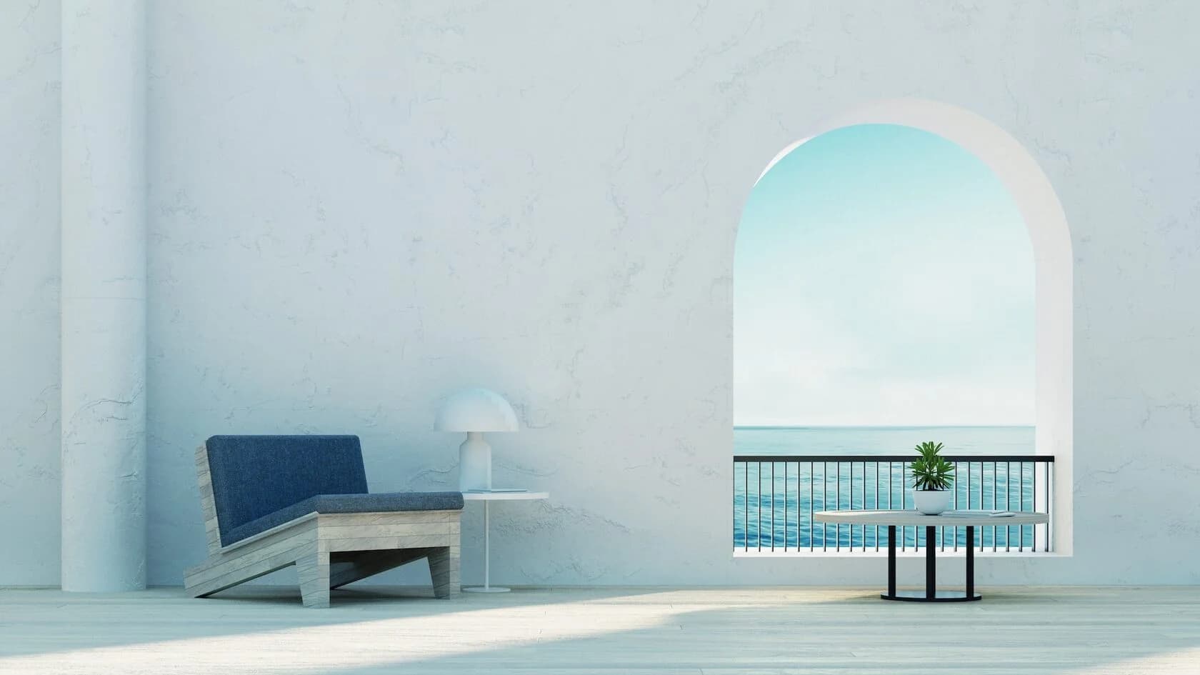 A bright Mediterranean terrace with an arched sea view