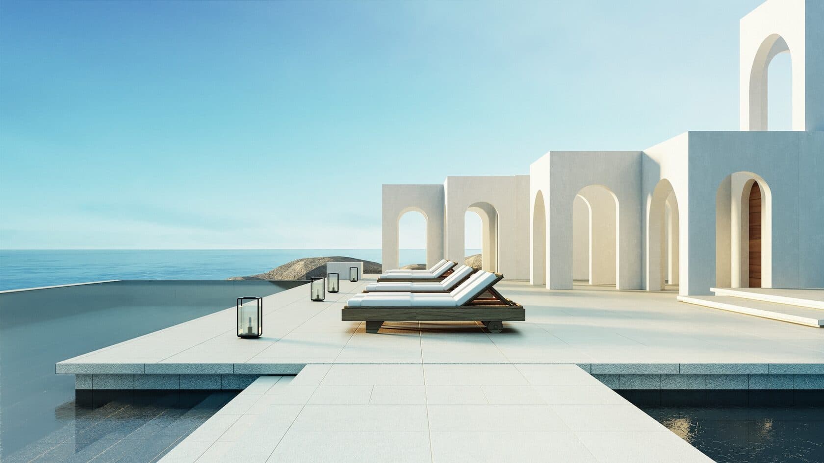 A white seaside resort terrace overlooking the Mediterranean